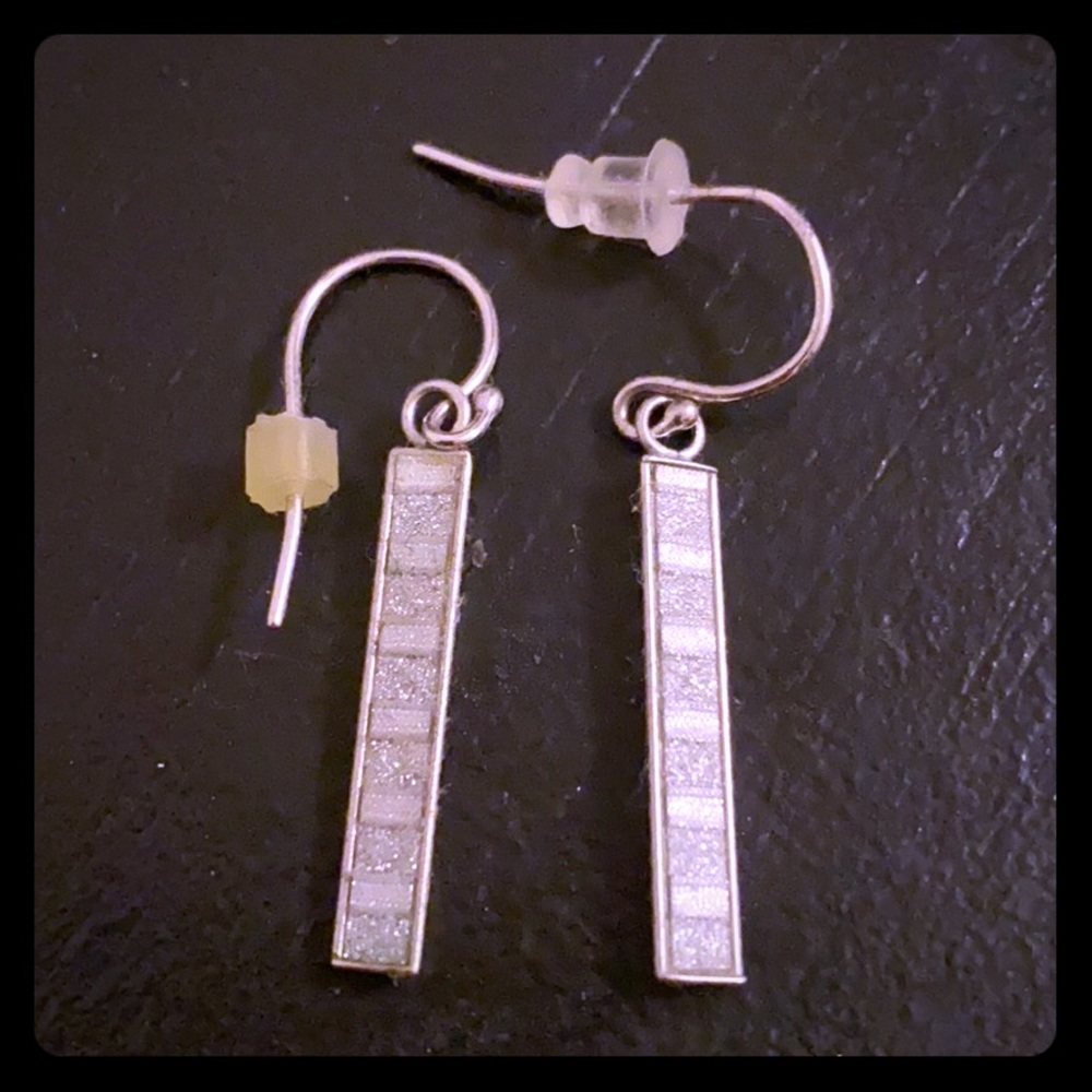 Small dangle earrings.